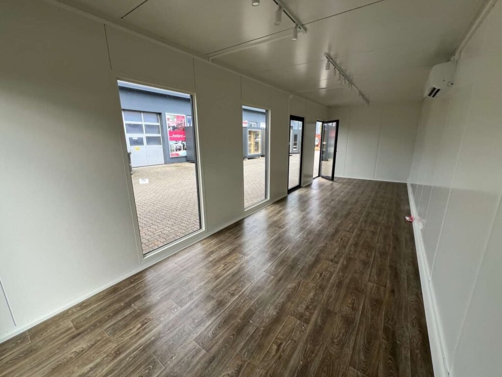 Wohncontainer Ausstellung Bürocontainer Abverkauf Tiny House Musterhaus Gartenhaus kaufen winterfest isoliert modern mit Küche und Bad WC Typ G27D